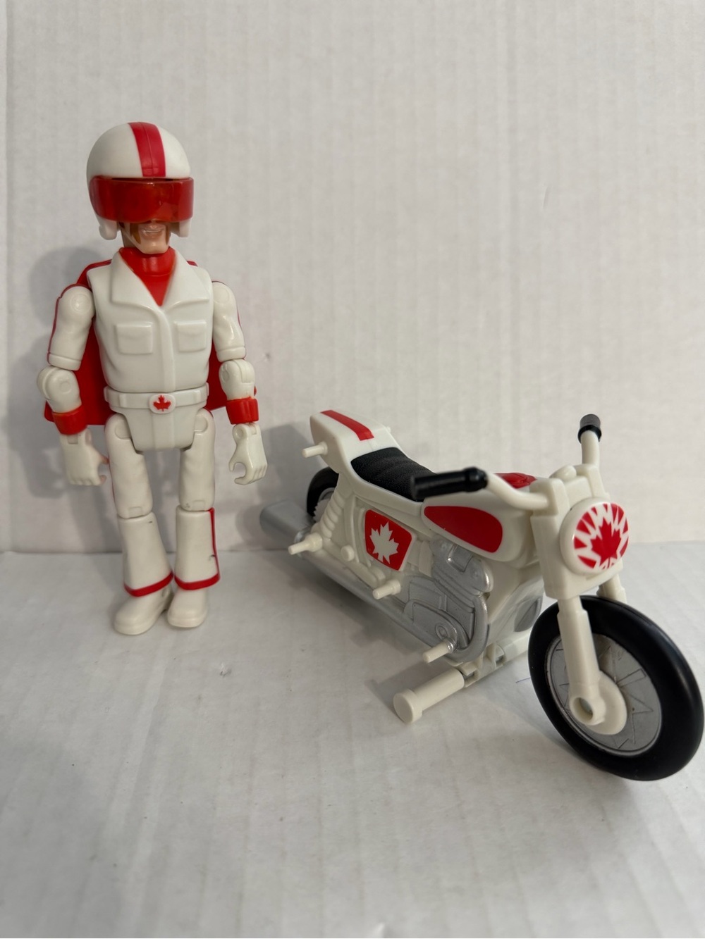 Disney Pixar Toy Story 4 Duke Caboom Action Figure with Matching Motorcycle
